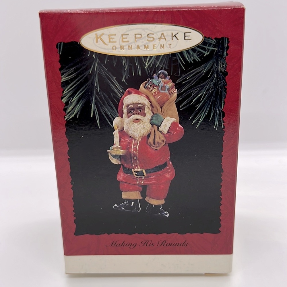 3/$25 Hallmark  keepsake ornament African-American Santa, making his rounds